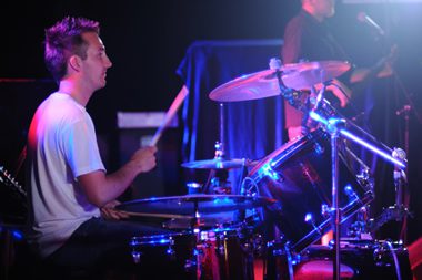Playing drums