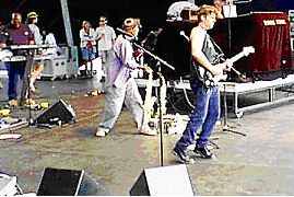 Shane Theriot out front with the Neville Brothers.